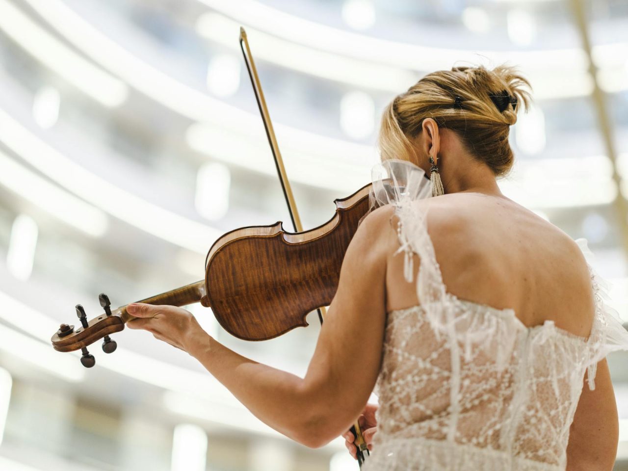 Professional violinist performing at an elegant event in Singapore