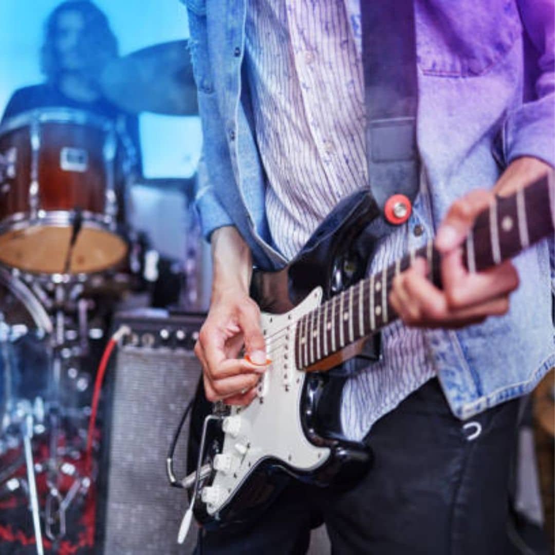 Live band guitarist and drummer performing in Singapore