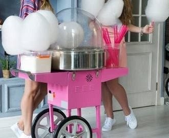 Candy floss cart with fresh cotton candy at a party
