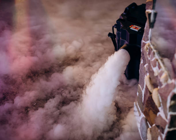 Fog machine blowing thick fog across an event floor