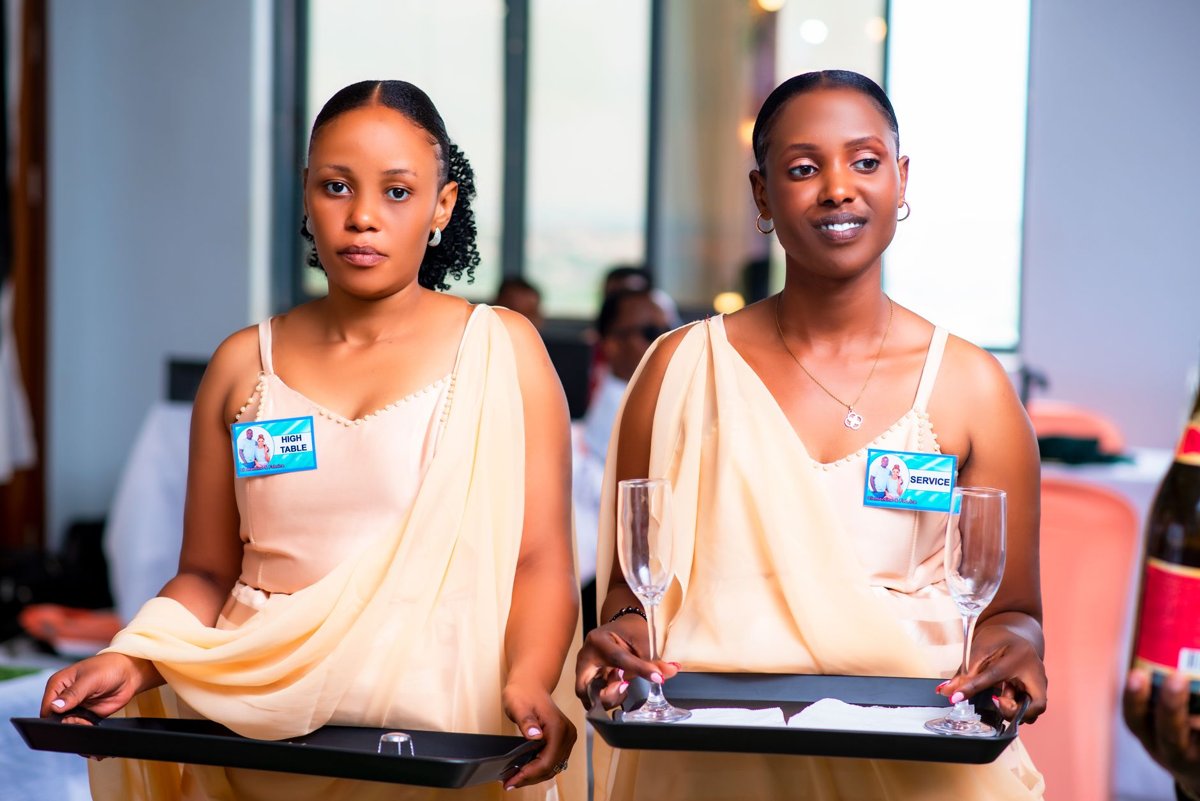 Event staff serving drinks on trays
