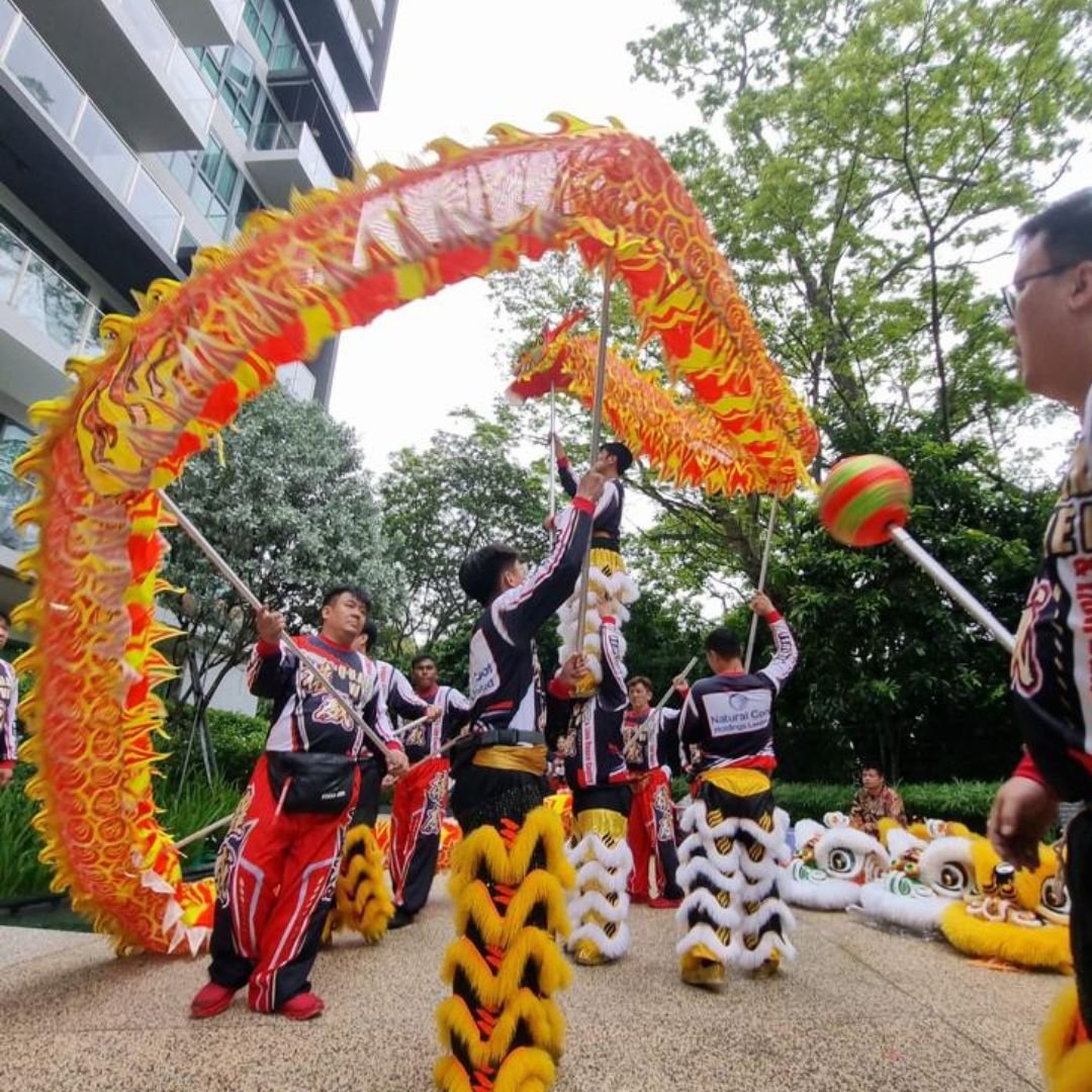 Dragon dance troupe performing outdoors in Singapore