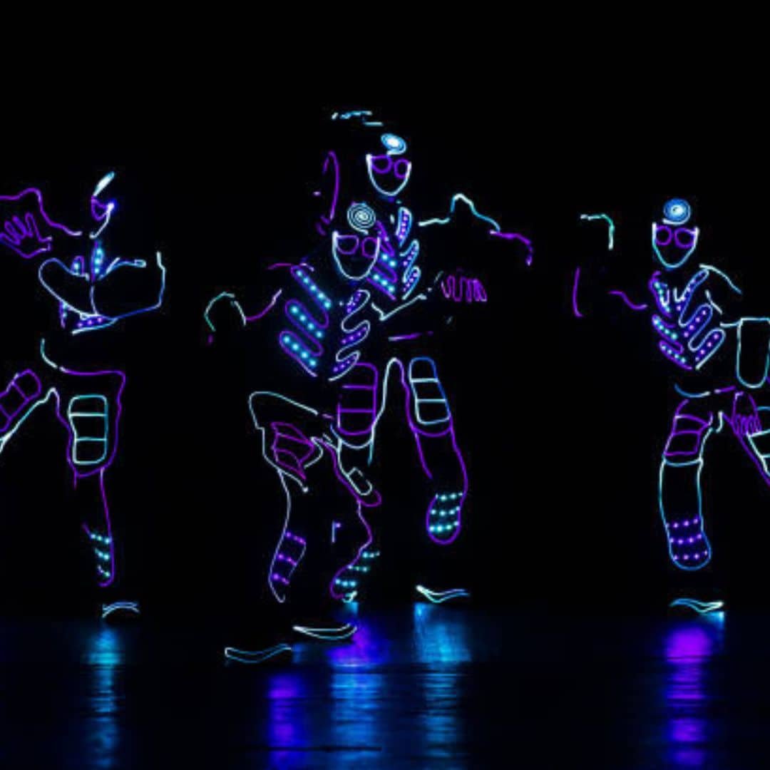Blue LED robot dance crew performing in Singapore